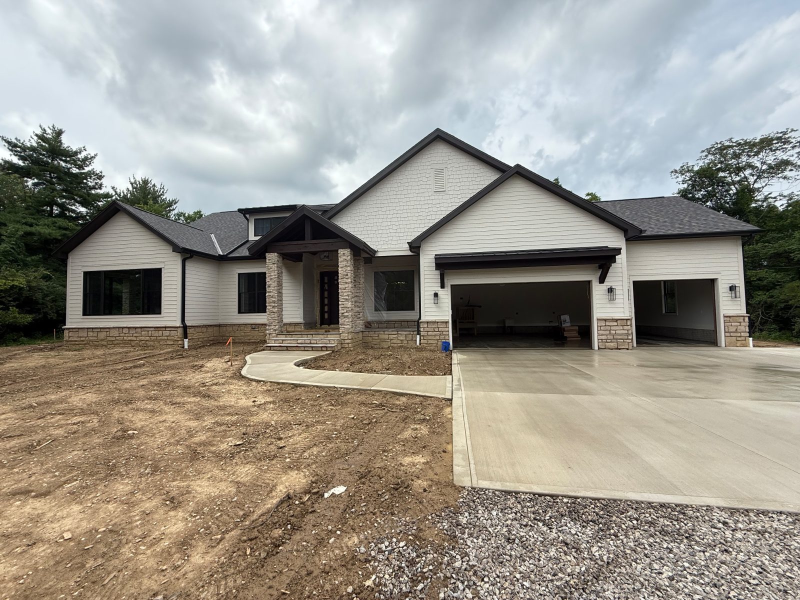 Whole-home exterior cleaned by Mullet Power Wash in Central Ohio — siding, driveway and walkway