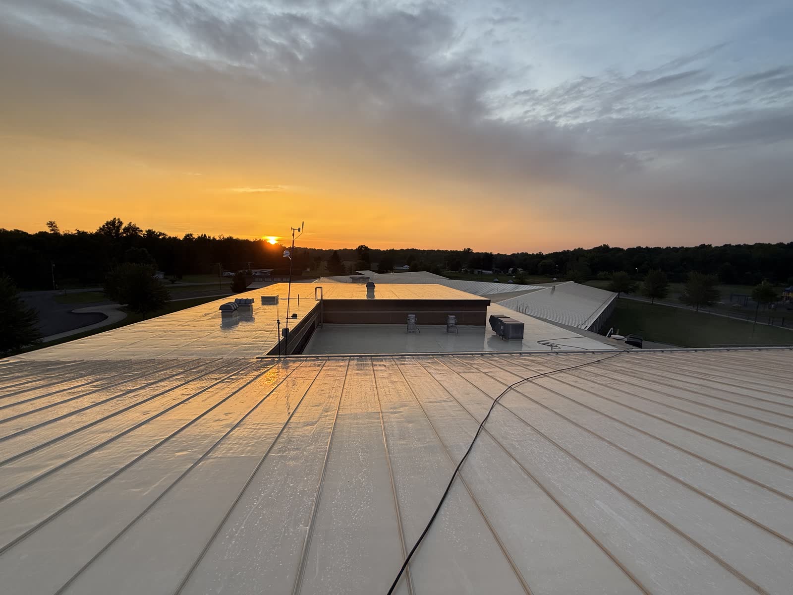 Freshly cleaned metal roof at sunset in Central Ohio