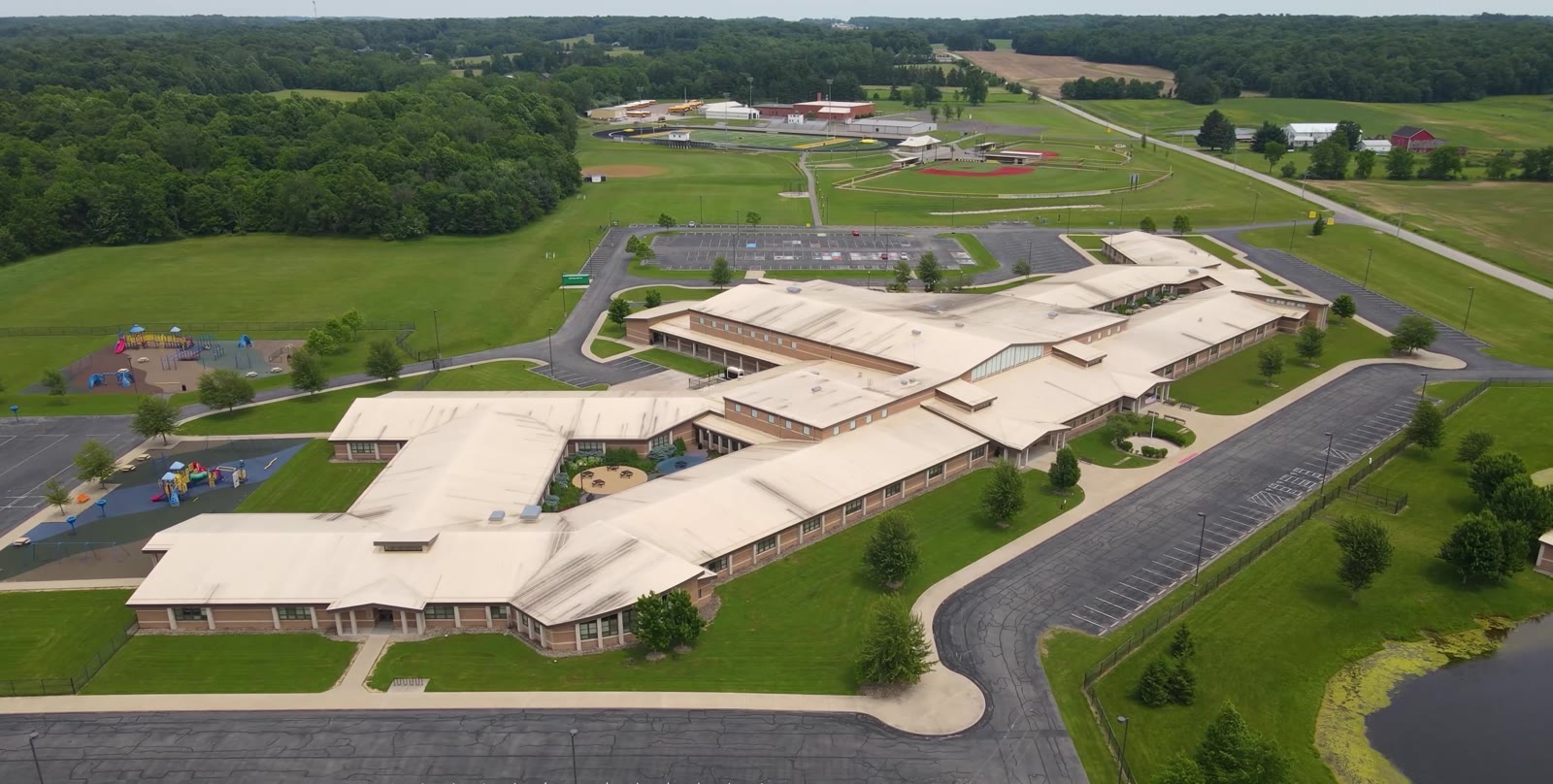 Aerial view of a large commercial building serviced by Mullet Power Wash in Central Ohio