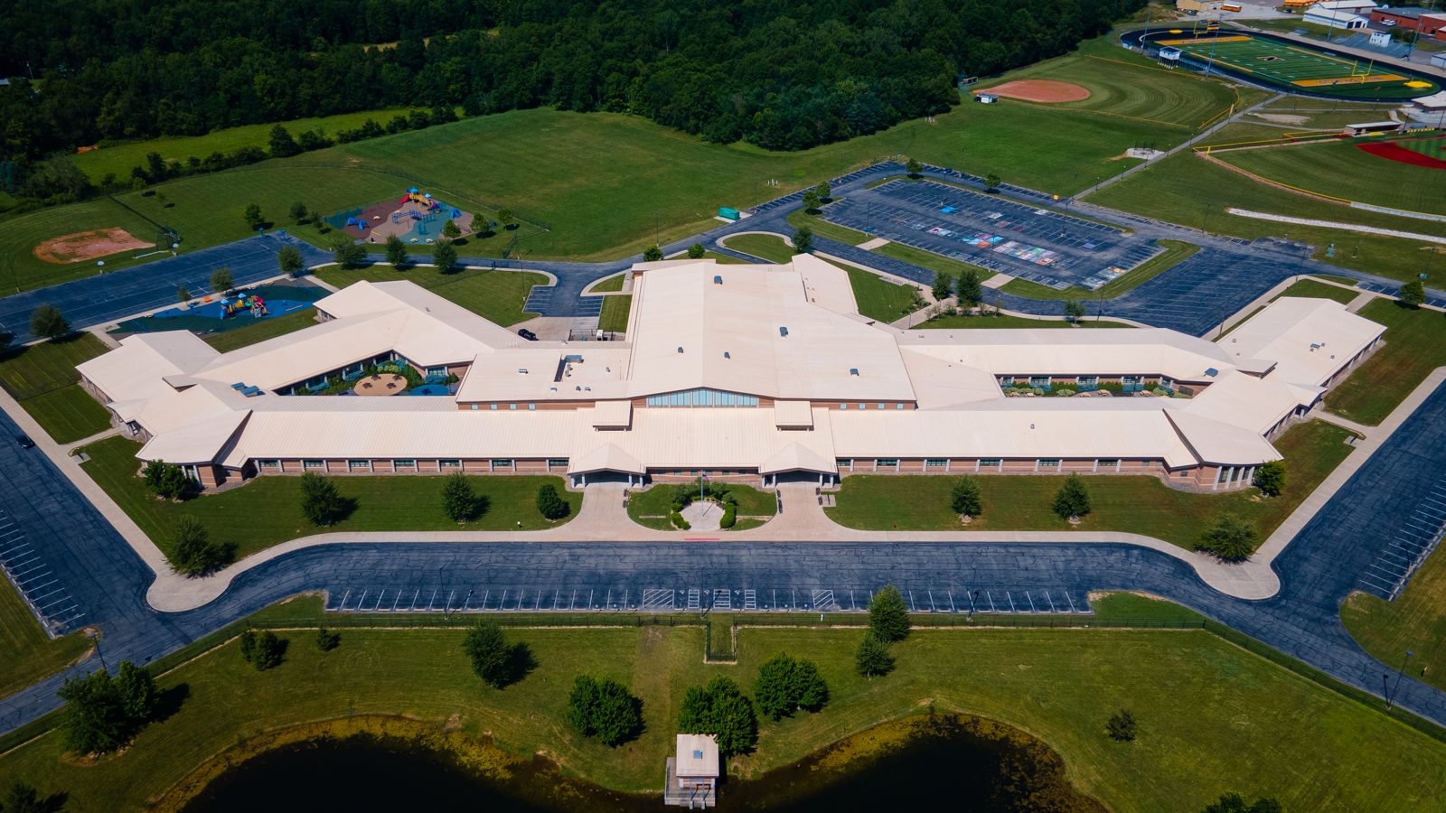 The same Central Ohio school roof after a commercial soft wash, clean and even across the whole building
