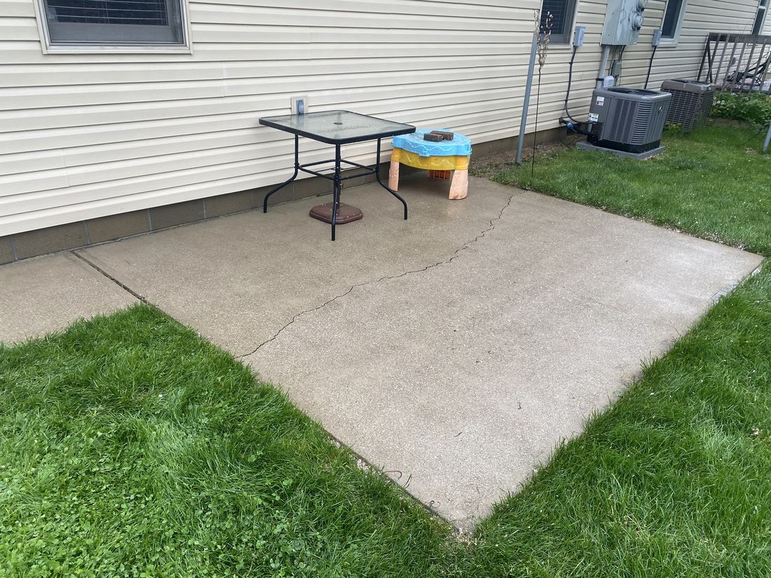 Back concrete pad after washing by Mullet Power Wash