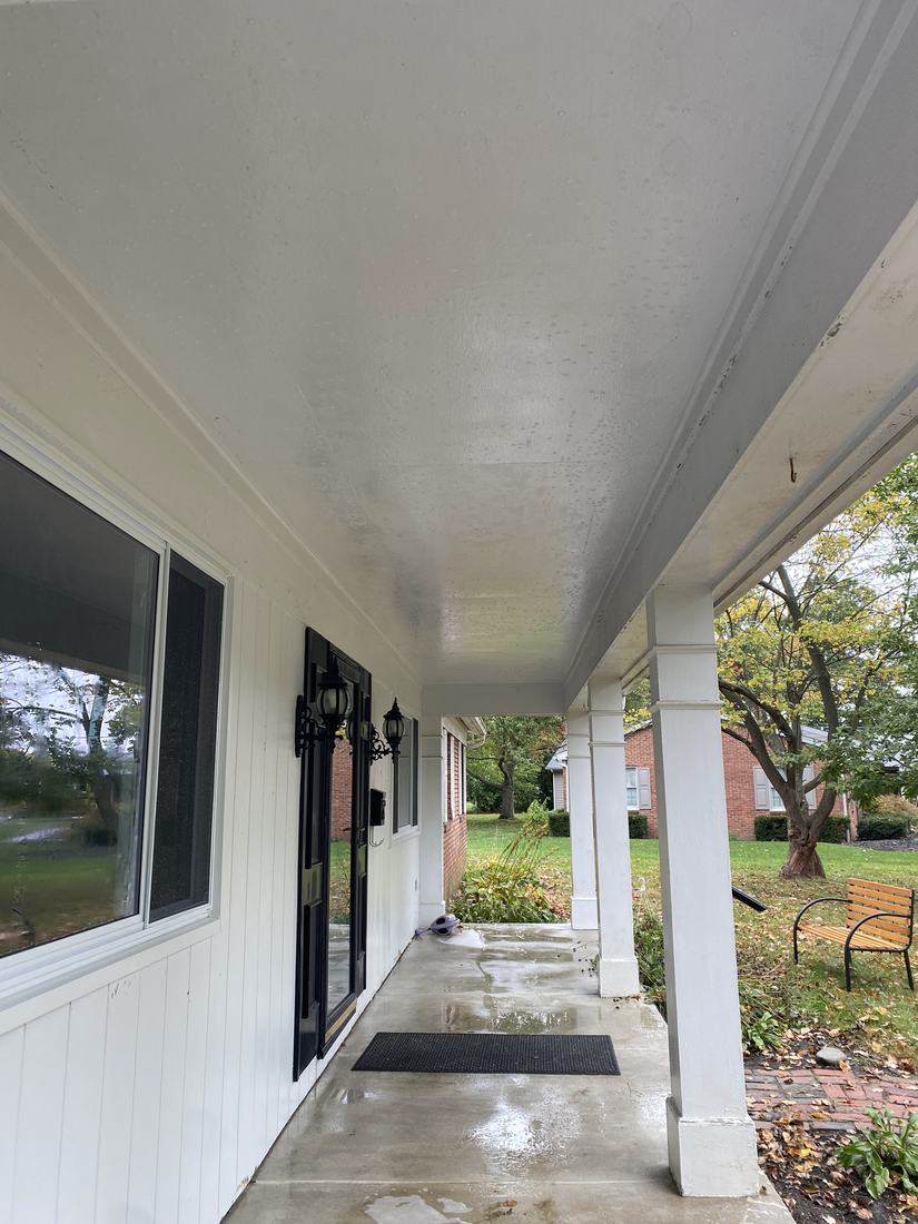 Covered front porch and ceiling after washing by Mullet Power Wash