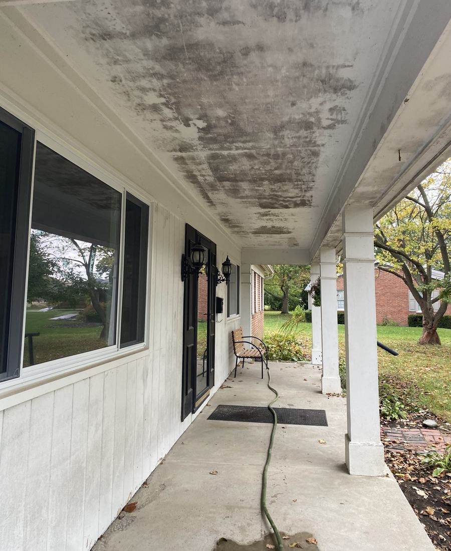 Covered front porch and ceiling before washing