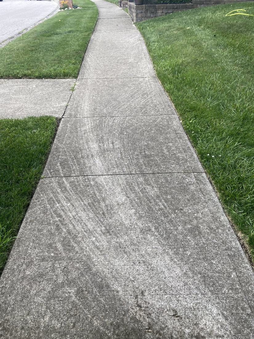 Curving sidewalk before washing