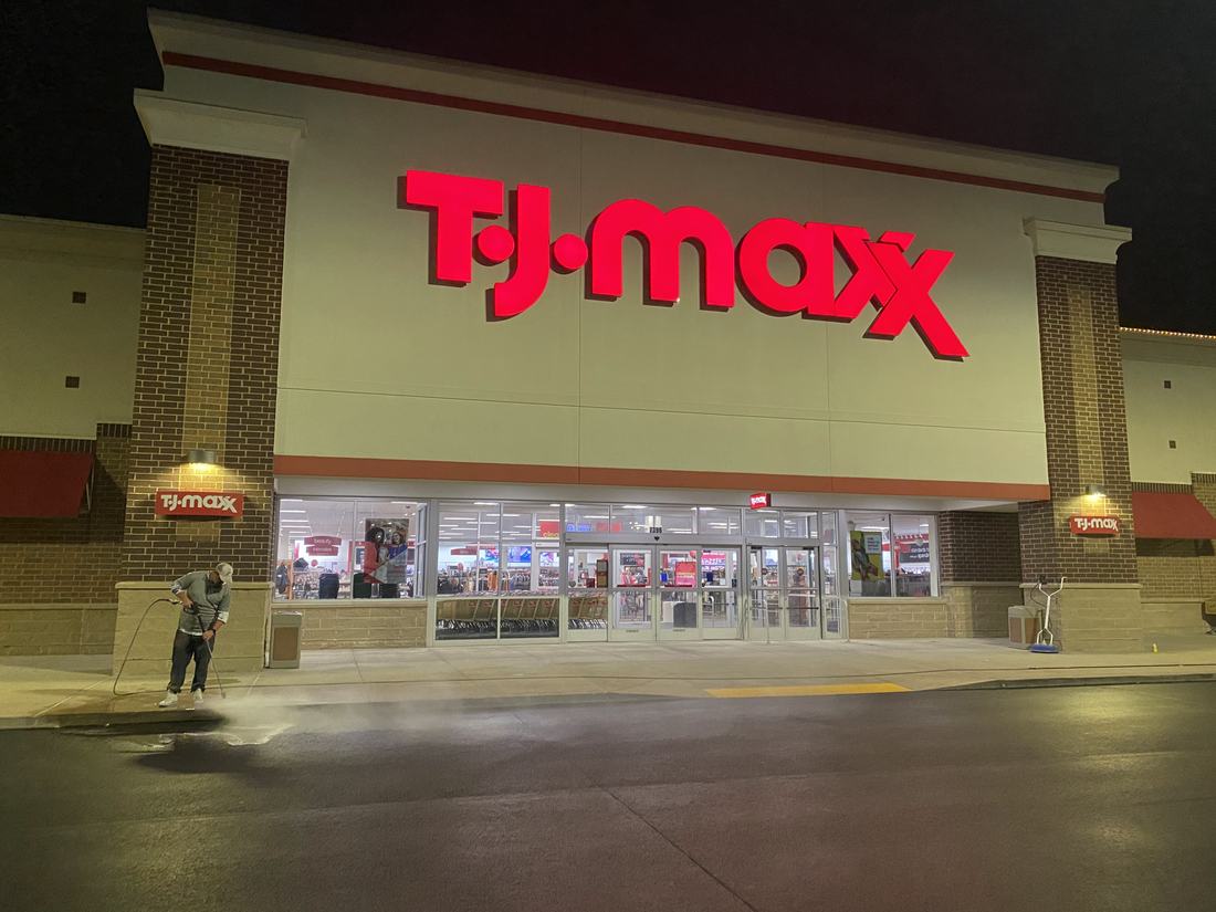 Retail storefront and sidewalk being pressure washed after hours in Central Ohio