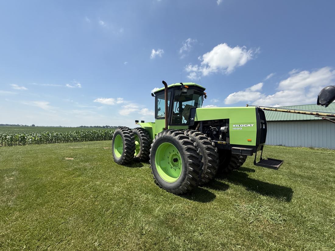 Green four-wheel-drive tractor after washing on a Central Ohio farm