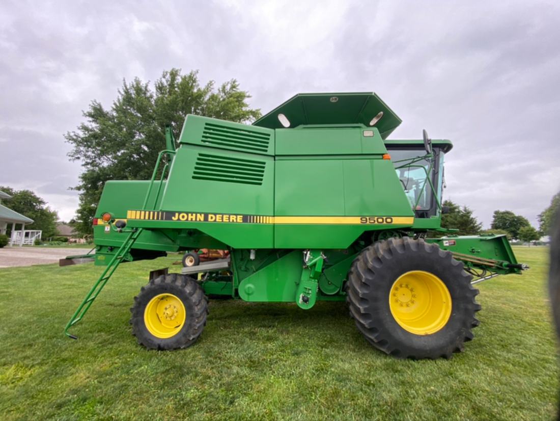 Green combine harvester washed by Mullet Power Wash in Central Ohio