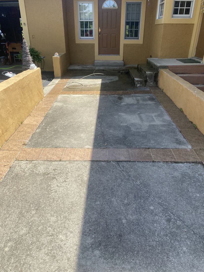 Front courtyard concrete before washing