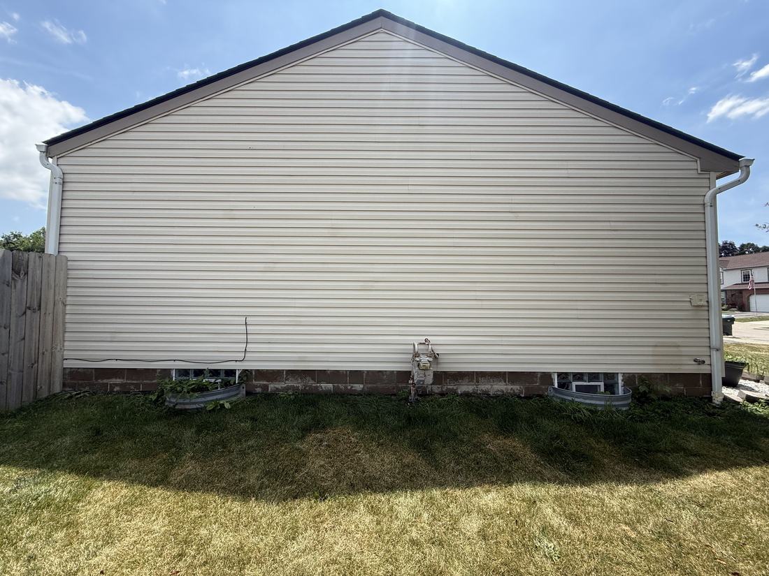 Gable end, the full wall after washing by Mullet Power Wash