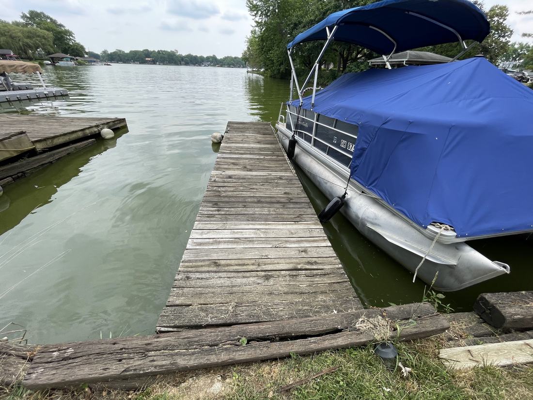 Lakeside boat dock before washing