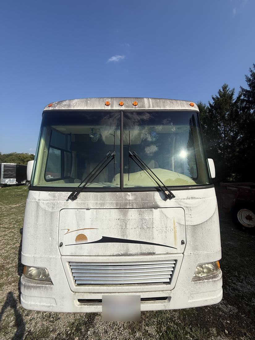 Class A motorhome, front before washing