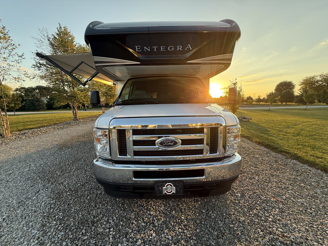 Class C motorhome washed clean, front view at sunset, in Central Ohio