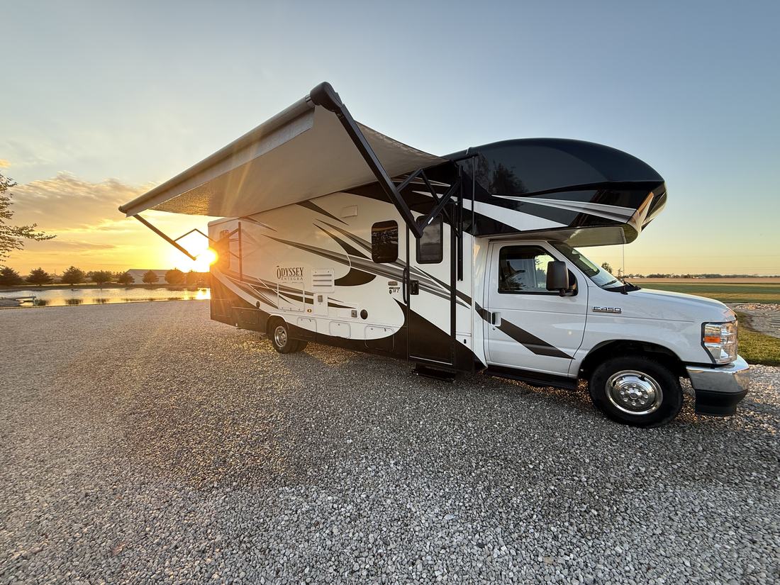 Class C motorhome with awning out after a wash in Central Ohio