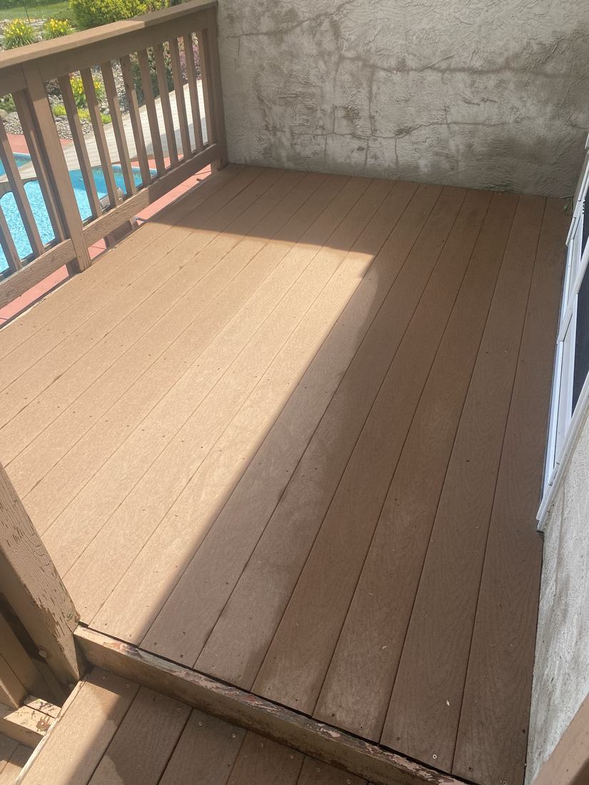 Weathered deck boards after washing by Mullet Power Wash