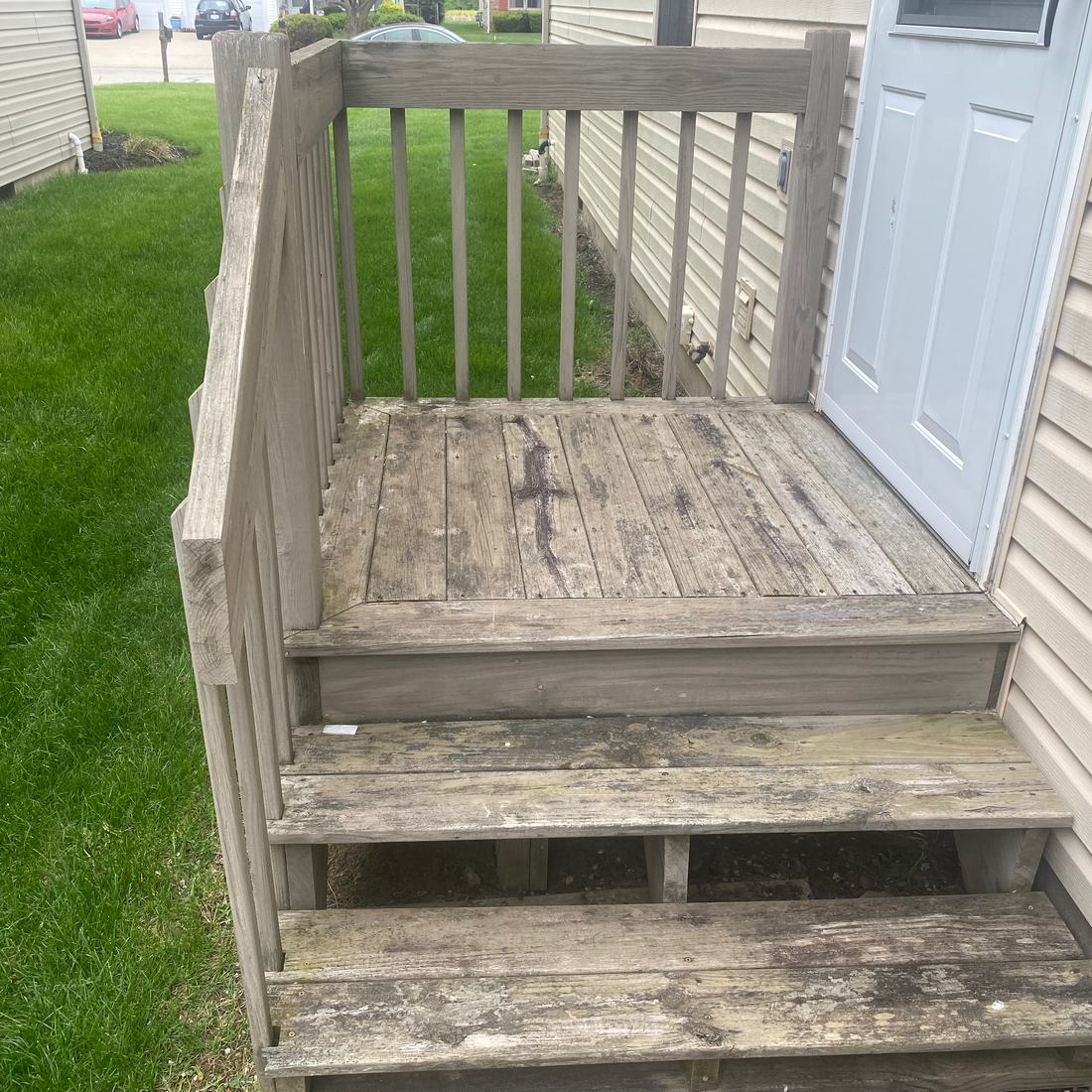 Wooden entry steps before washing